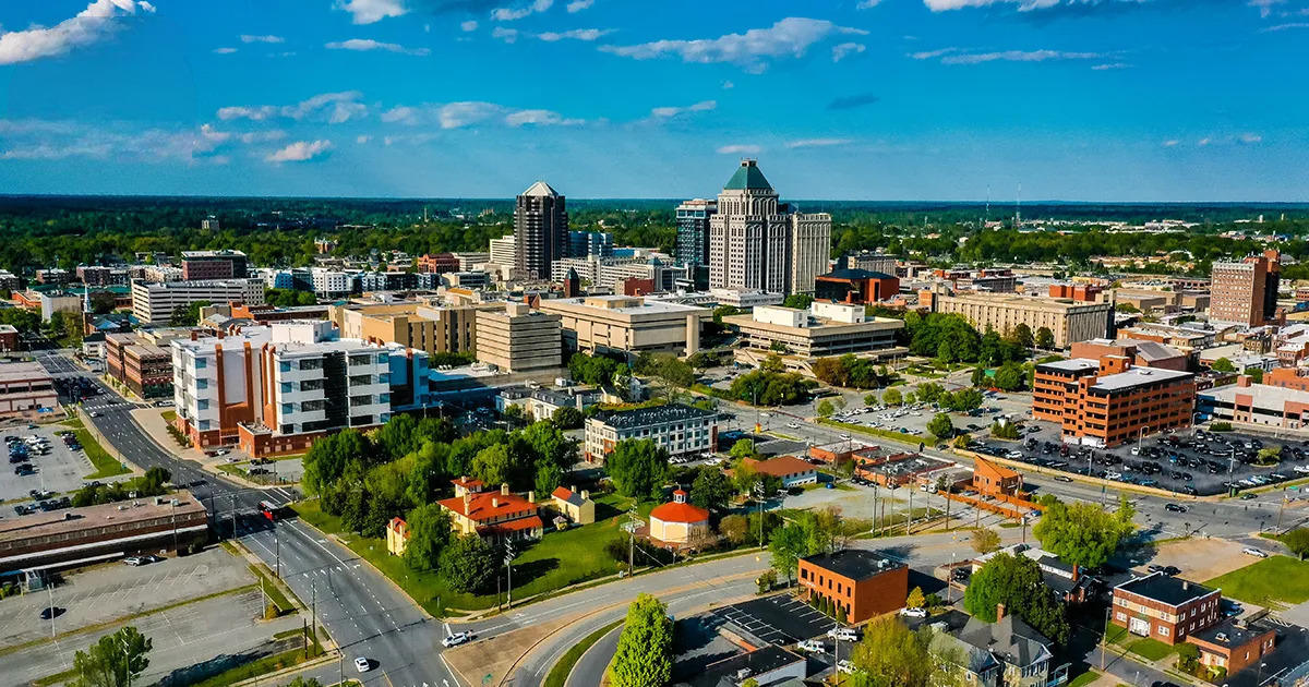 Illustration of three connected points representing Greensboro, High Point, and Winston-Salem